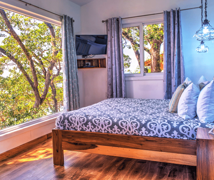 bed in Treehouse Villa room